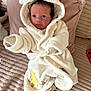 Willow joined the competition — help win amazing prizes! baby, infant, robe, white_robe, hood, bear_ears, blanket, cushion, face, eyes, cute, soft, cozy, indoor, newborn, person, sleepwear, texture, comfort, lying_down