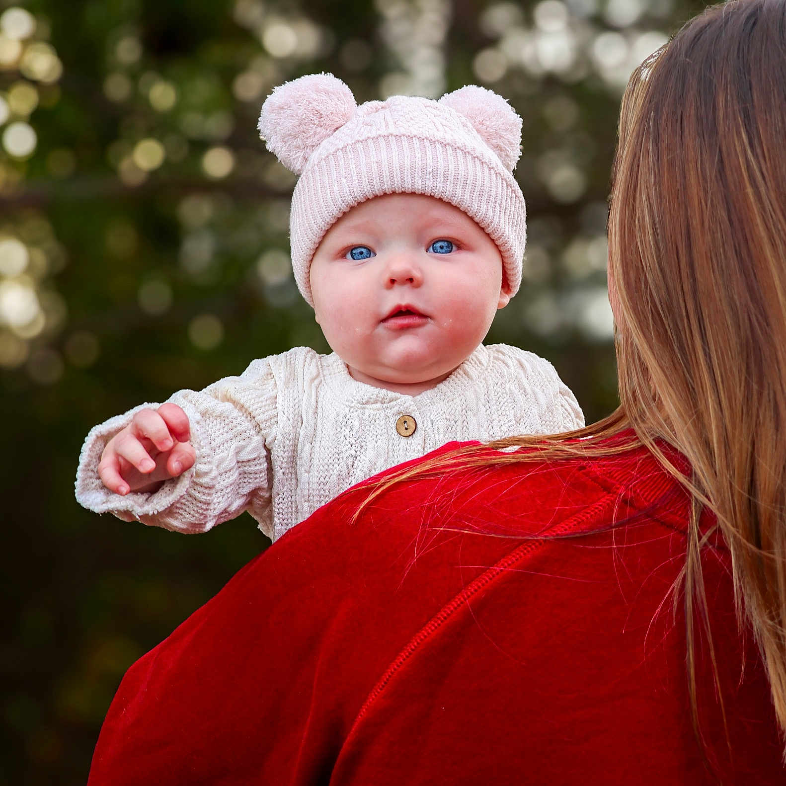 Ava is registered to the contest to win money with this photo: baby, beanie, bodypart, bonnet, cap, clothing, dress, face, finger, hand, happy, hat, head, knitwear, newborn, person, photography, portrait, smile, sweater