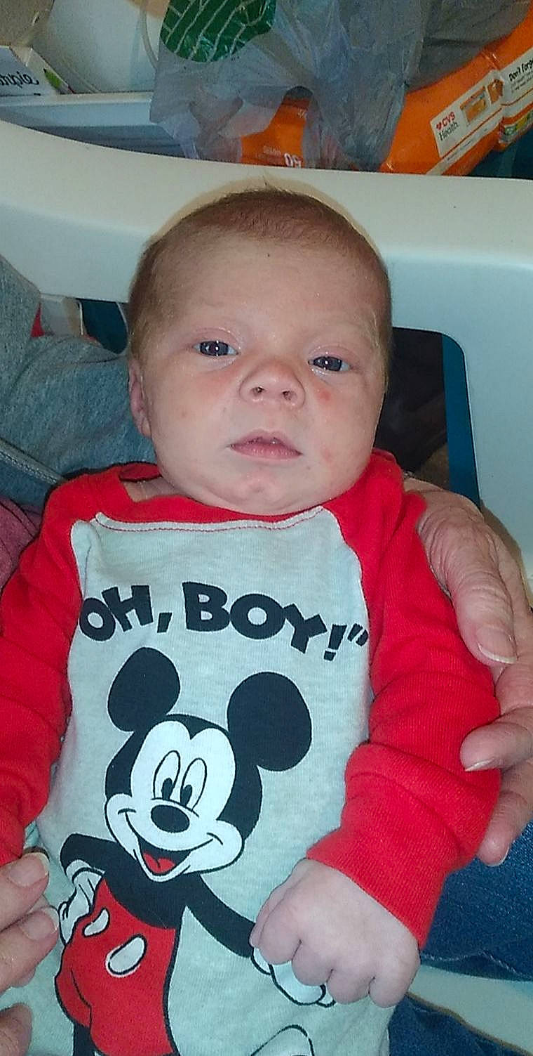 Kristoph is registered to the contest to win money with this photo: arm, baby, baby_toddler_clothing, cheek, cool, facial_expression, finger, happy, lip, mouth, nose, organ, person, pink, product, skin, sleeve, smile, t_shirt, toddler