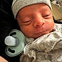 Samuel is registered to the contest to win money with this photo: newborn, baby, pacifier, blanket, hat, sleepy, closeup, infant, cute, cozy, wrapped, face, skin, person, child, indoors, soft, resting, headwear, apparel