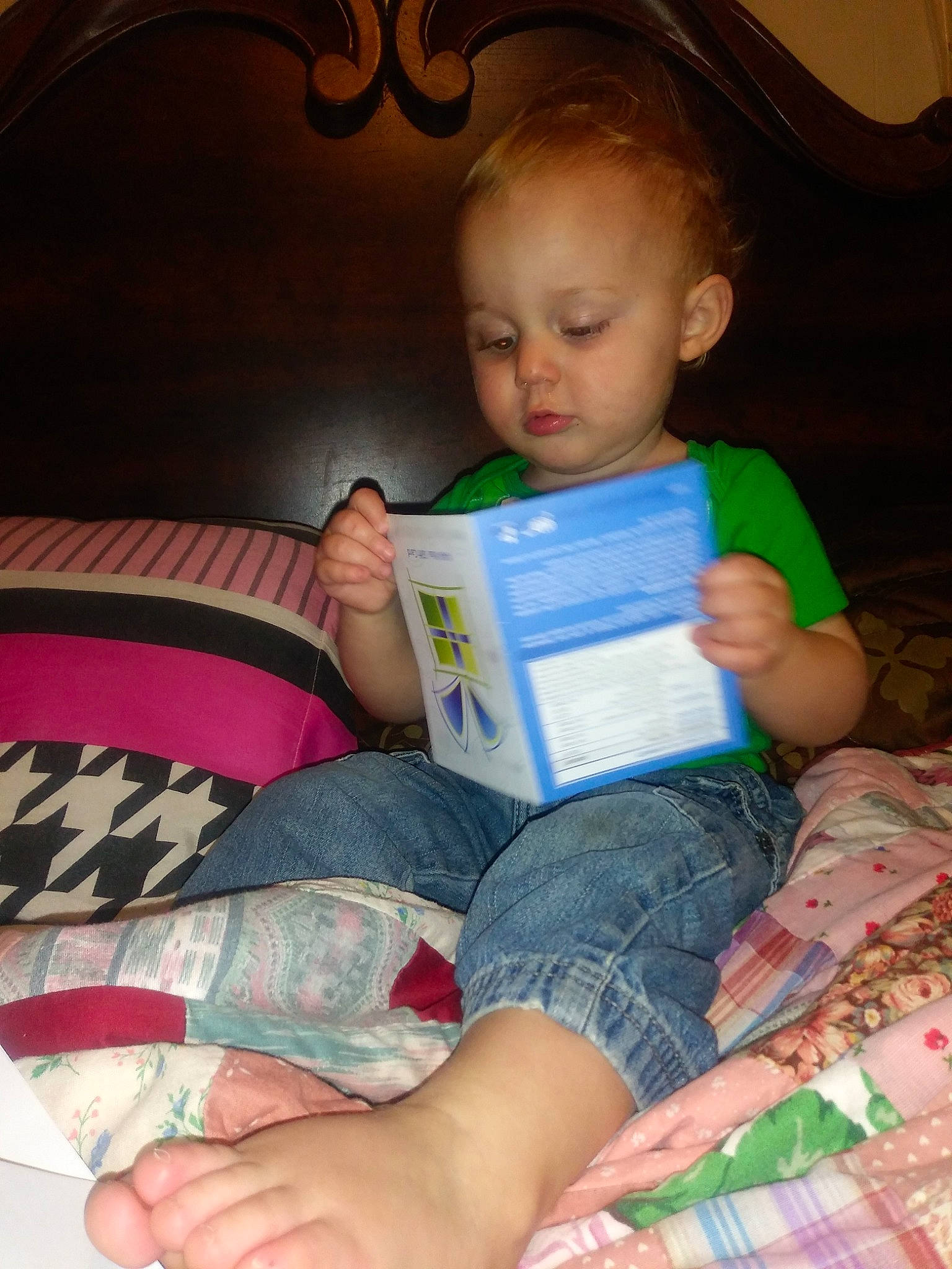 Harlan joined the competition — help win amazing prizes! baby, child, fun, person, play, reading, sitting, toddler