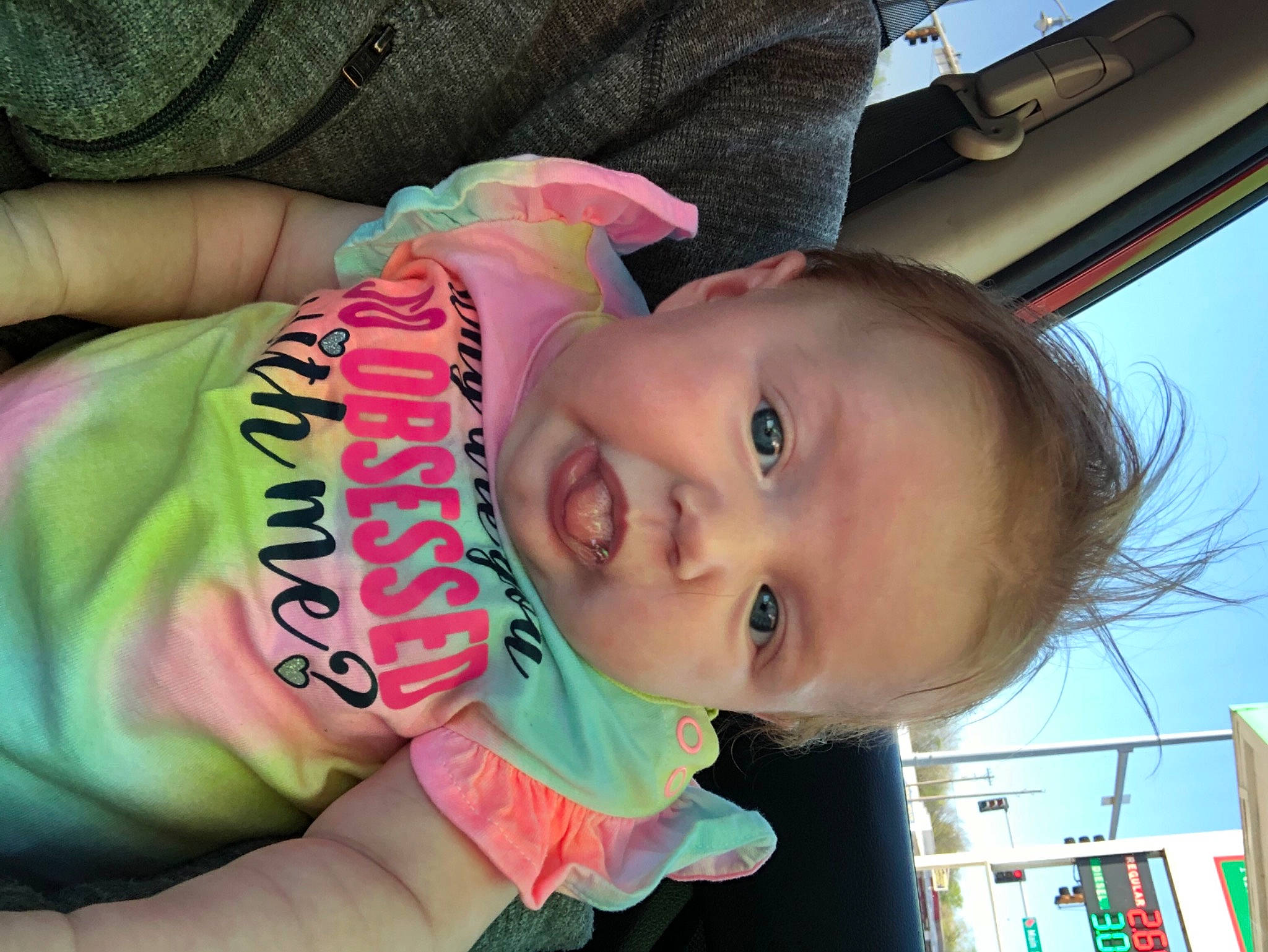 Carly is registered to the contest to win money with this photo: baby, baby_toddler_clothing, cheek, chin, cool, ear, eye, eyebrow, eyelash, finger, green, happy, iris, lip, mouth, neck, nose, person, pink, skin