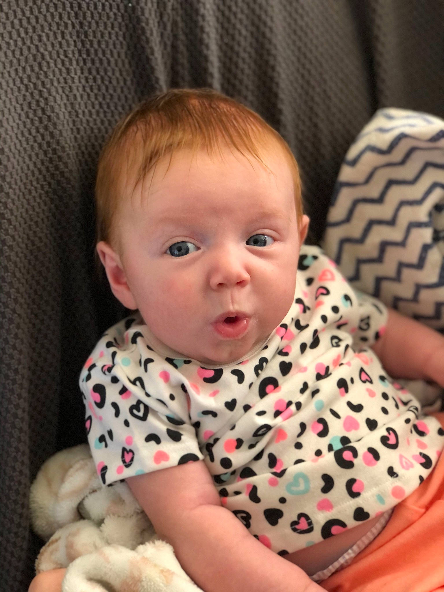 Carly joined the competition — help win amazing prizes! arm, baby, baby_toddler_clothing, cheek, child, chin, collar, comfort, eye, finger, head, human_body, iris, lip, neck, nose, person, sitting, skin, sleeve