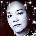 Sandra T. F.