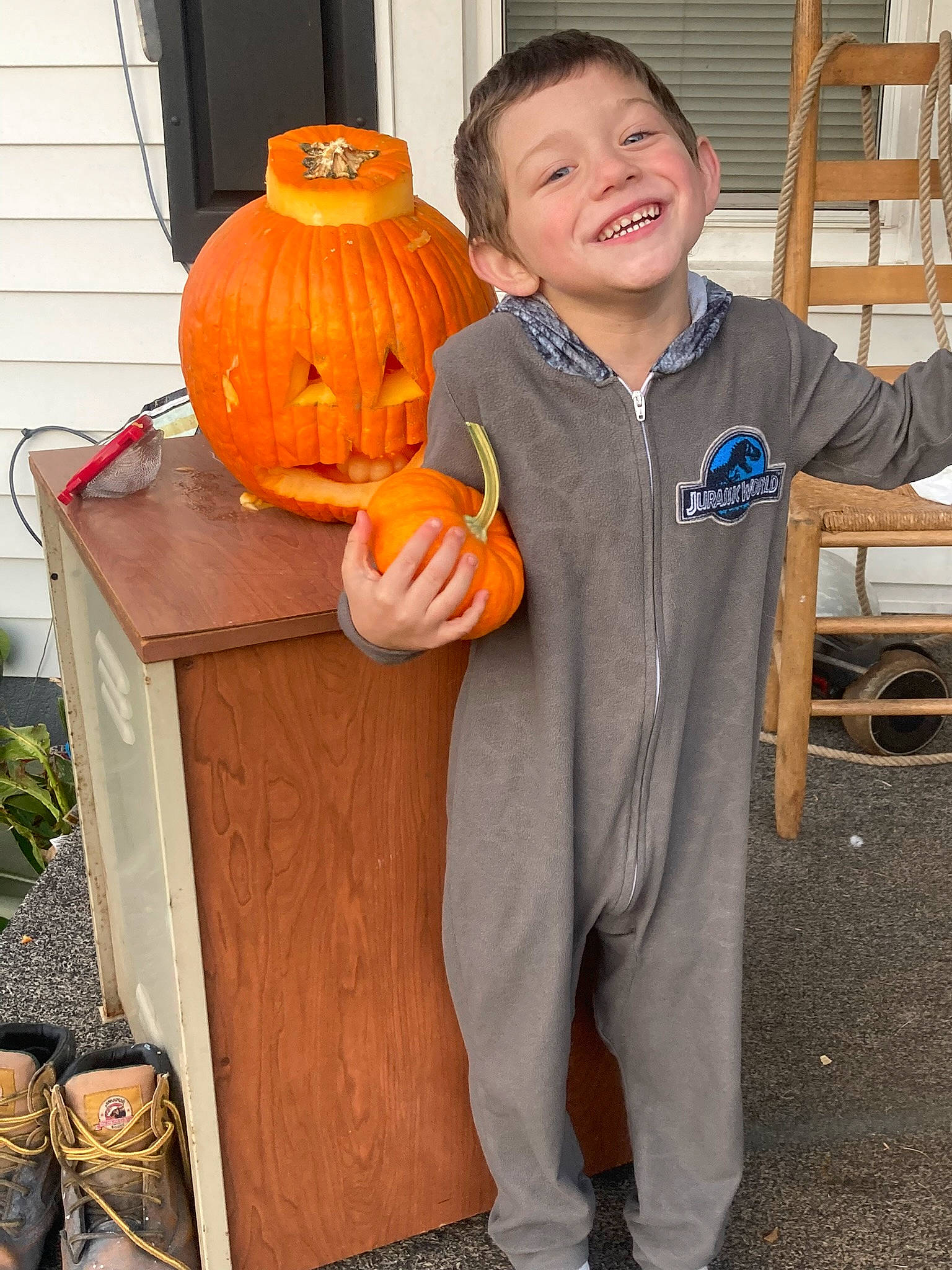 Hunter joined the competition — help win amazing prizes! calabaza, cucurbita, eye, face, gourd, head, jack_o_lantern, joy, natural_foods, orange, person, plant, pumpkin, smile, squash, toddler, tree, trick_or_treat, vegetable, window