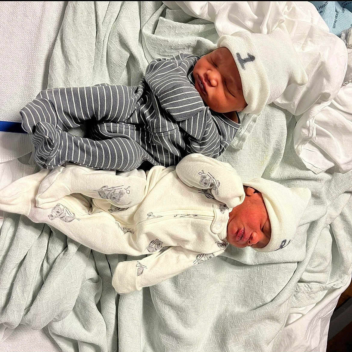 Jamari And Jamarius is registered to the contest to win money with this photo: baby, bed, blanket, clothing, cozy, cute, hat, healthcare, indoor, infant, newborn, newborn_baby, onesie, peaceful, person, portrait, rest, sleeping, soft, twin
