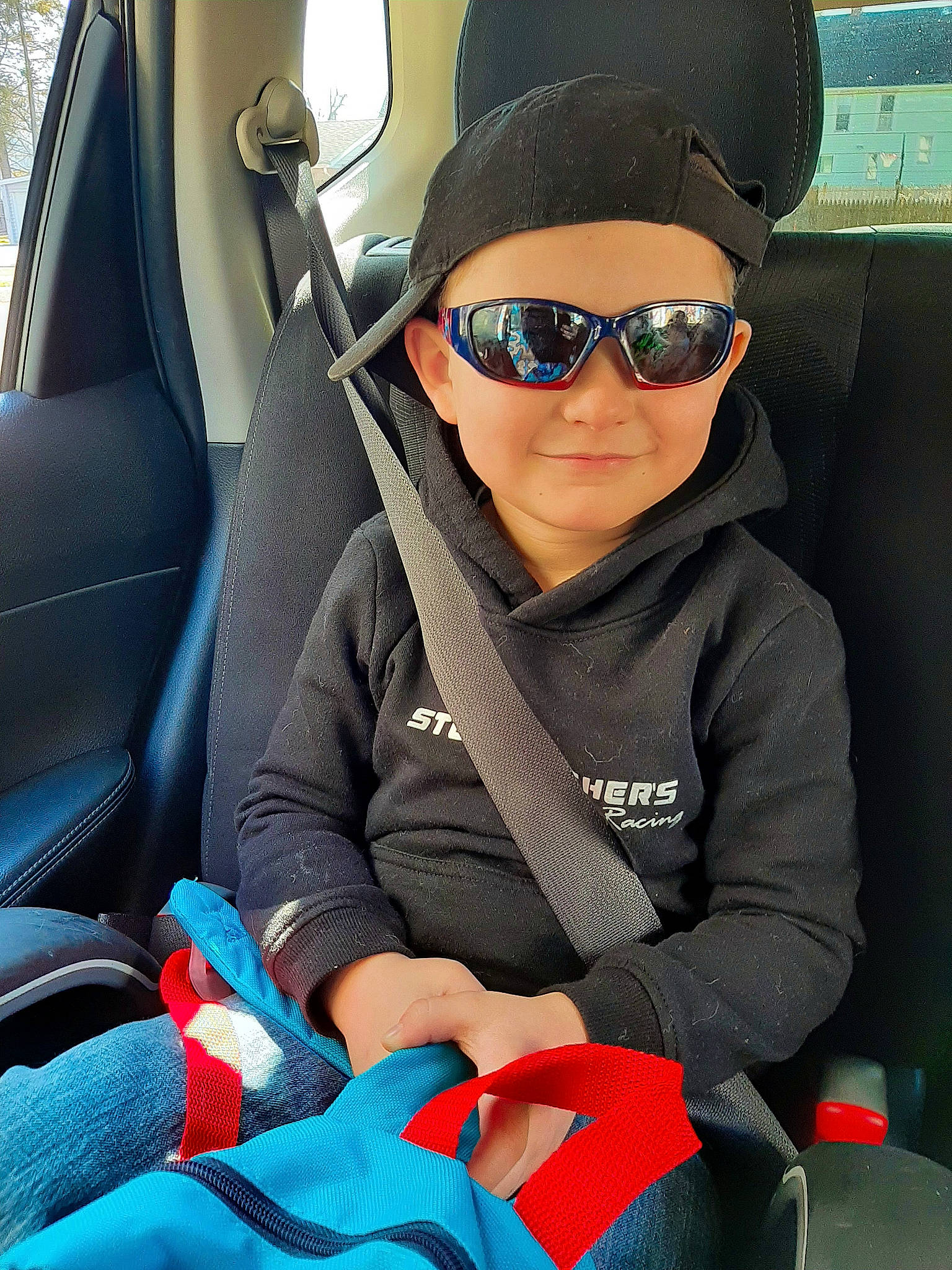 Easton joined the competition — help win amazing prizes! auto_part, automotive_design, automotive_exterior, cap, car, car_seat, car_seat_cover, comfort, electric_blue, eyewear, goggles, head_restraint, headwear, motor_vehicle, person, seat_belt, sunglasses, toddler, vehicle, vehicle_door
