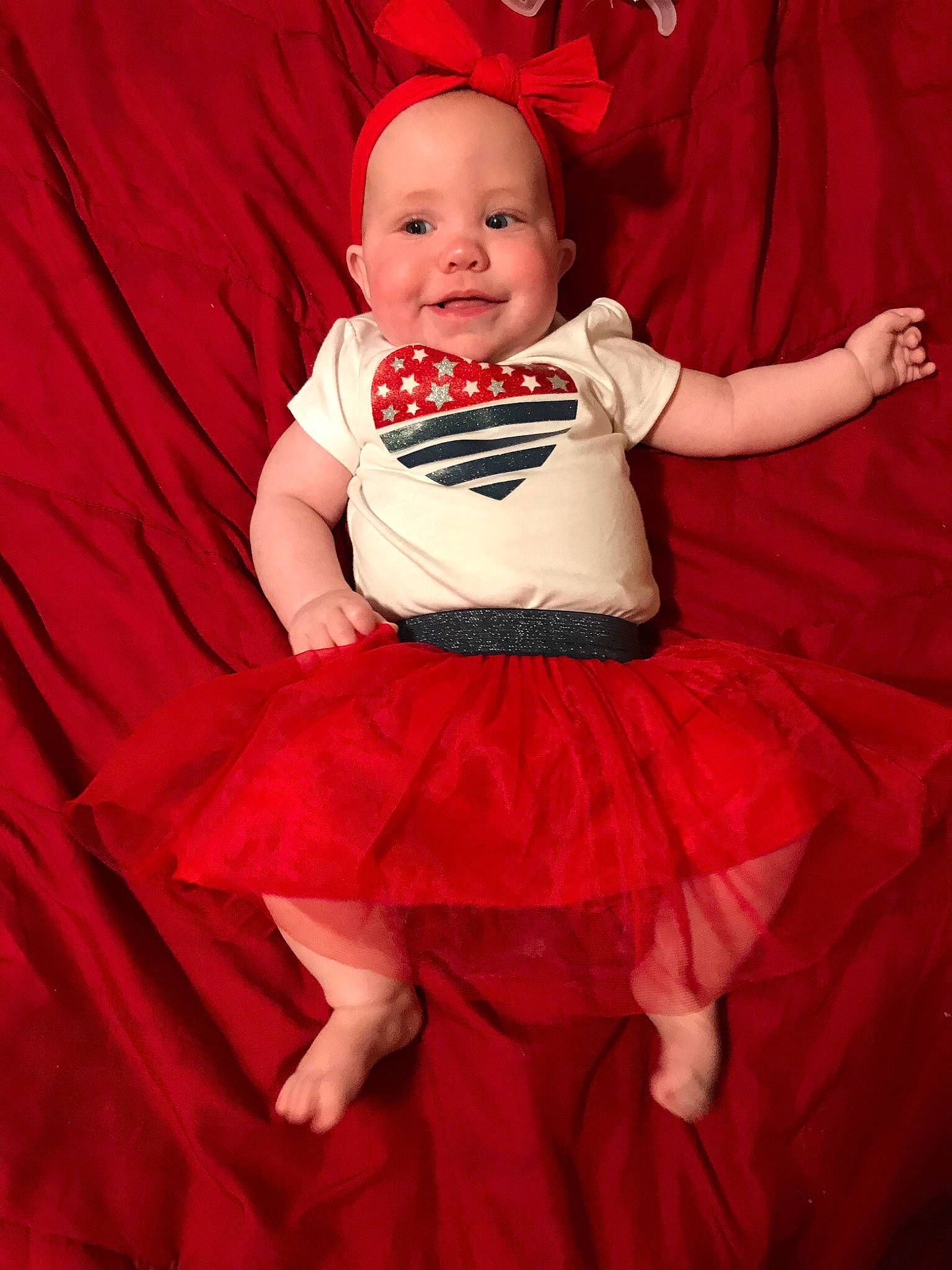 Carrie is registered to the contest to win money with this photo: baby, baby_products, child, child_model, costume, dress, joy, mouth, person, photography, pink, red, smile, toddler