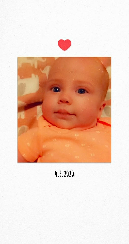 Carrie is registered to the contest to win money with this photo: baby, bathing, cheek, child, face, head, lip, nose, orange, person, photography, pink, skin, smile, toddler