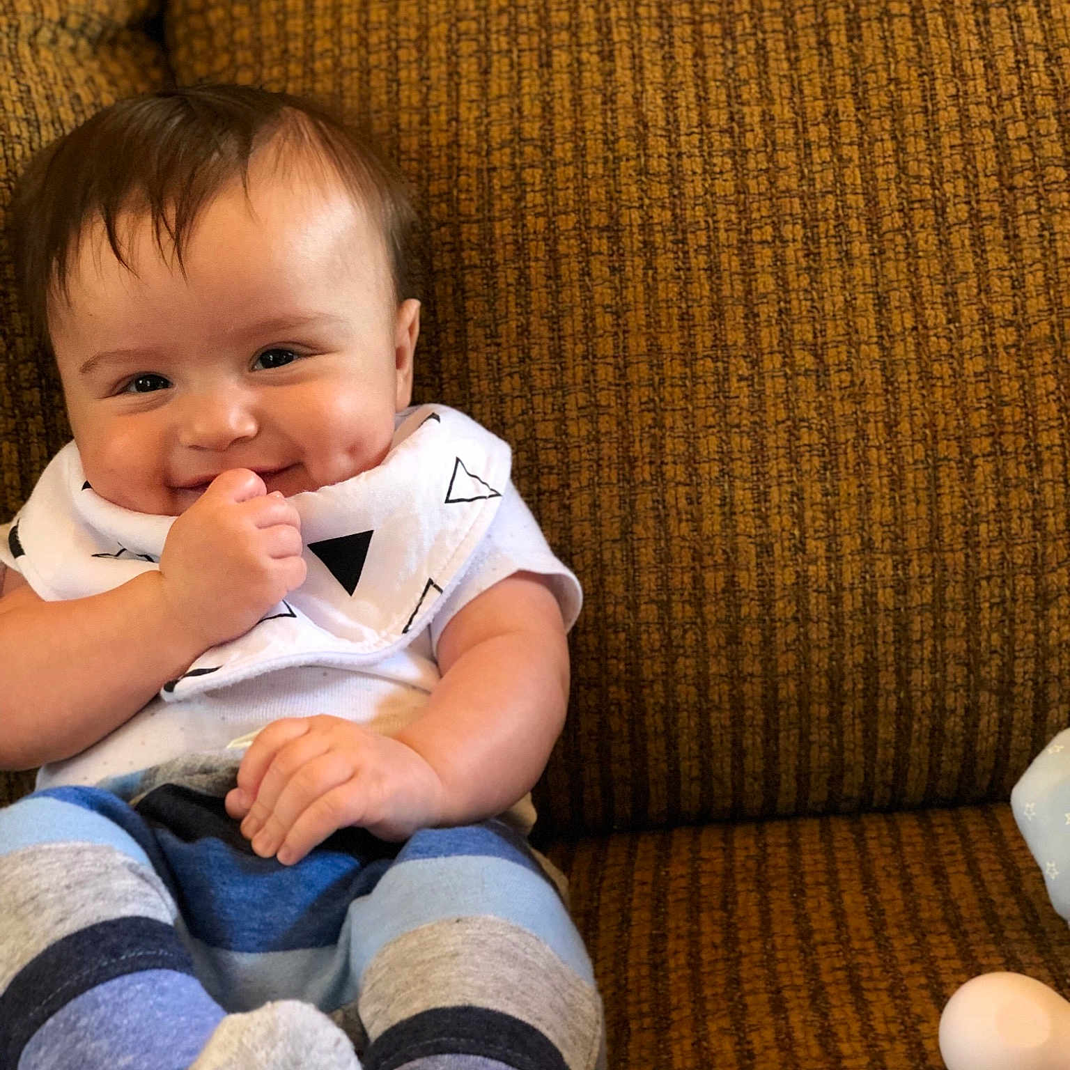 Grant is registered to the contest to win money with this photo: baby, child, joy, person, product, sitting, skin, toddler