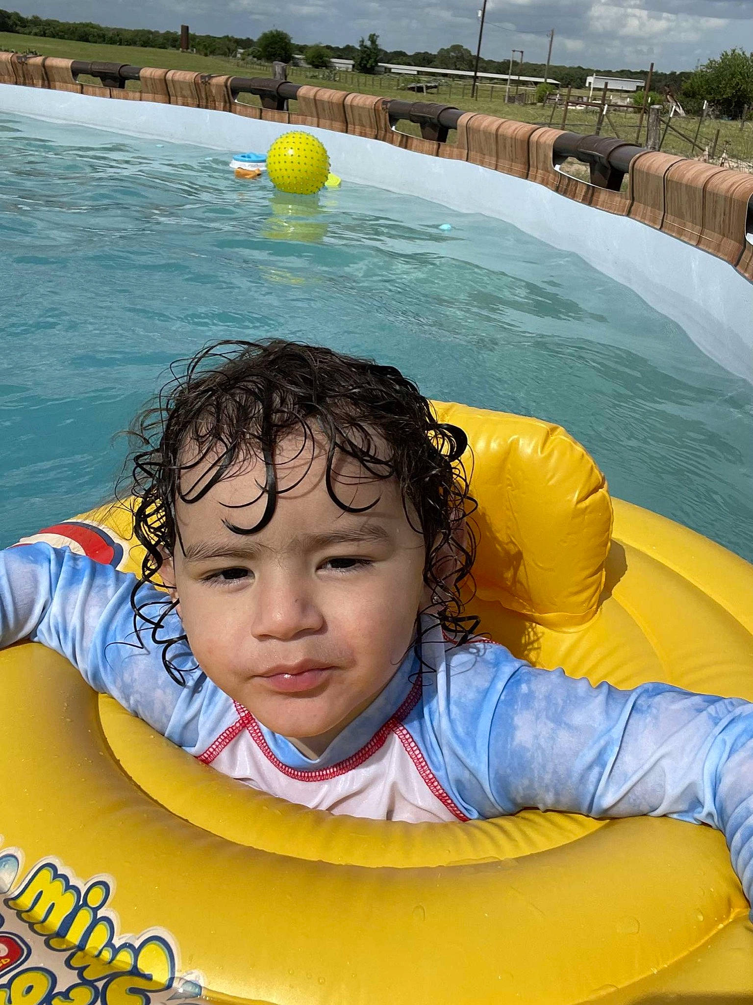 James joined the competition — help win amazing prizes! blue, cloud, cool, facial_expression, fun, grass, green, happy, leisure, morning, people, people_in_nature, person, recreation, sky, toddler, travel, tree, water, white