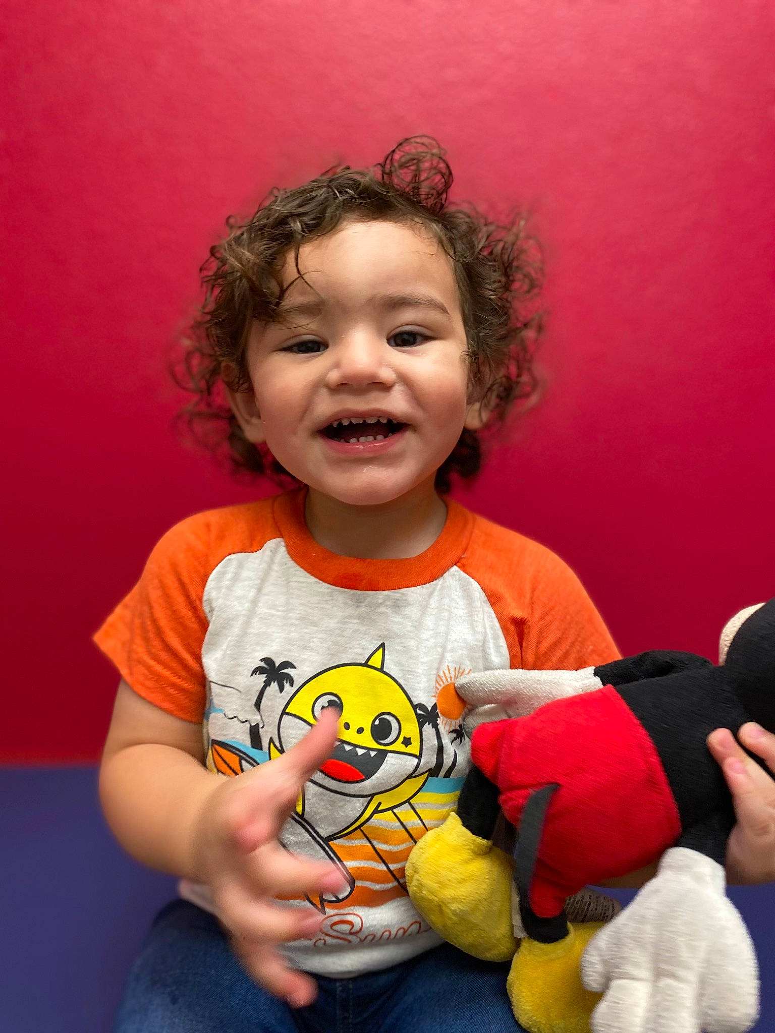 James is registered to the contest to win money with this photo: arm, baby_toddler_clothing, cheek, chin, eye, face, facial_expression, finger, gesture, hand, happy, head, human, human_body, mouth, nose, person, skin, sleeve, smile