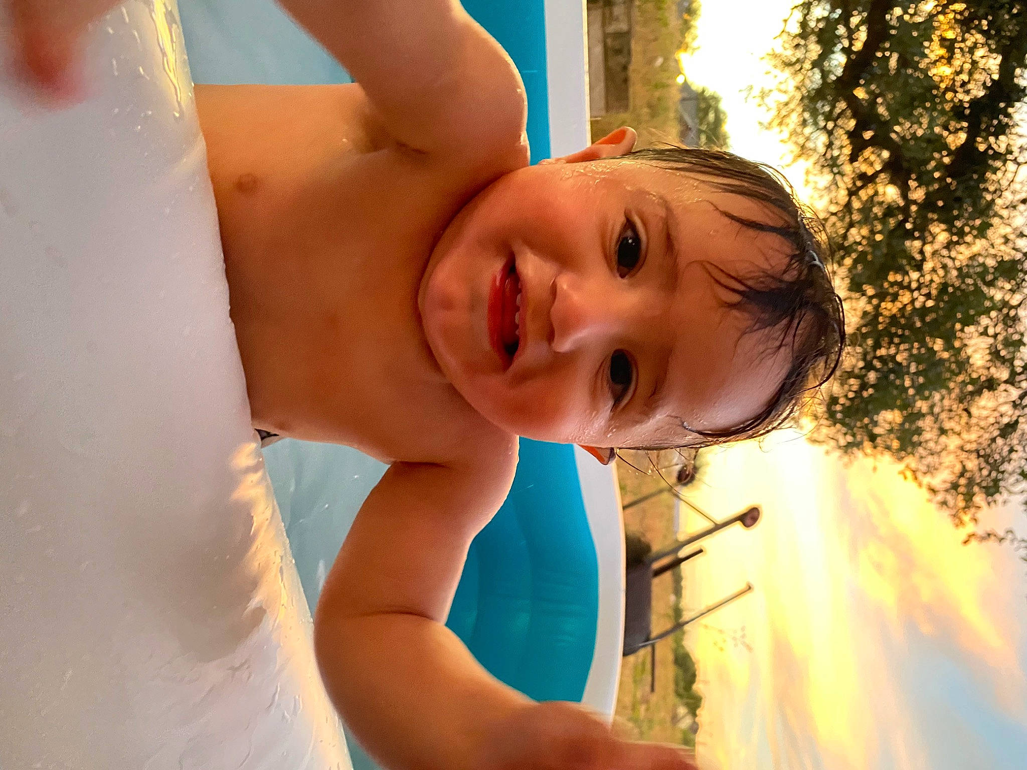 Julius joined the competition — help win amazing prizes! abdomen, baby, blond, chest, child, flash_photography, fun, grass, happy, human_body, joy, leisure, people_in_nature, person, portrait_photography, skin, smile, sunlight, swimming_pool, toddler