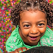 Autumn joined the competition — help win amazing prizes! bokeh, bright_colors, cheerful, child, close_up, colorful_background, curly_hair, expression, face, fingernails, green_clothing, happy, joyful, looking_up, patterned_clothing, person, playful, portrait, skin, smiling