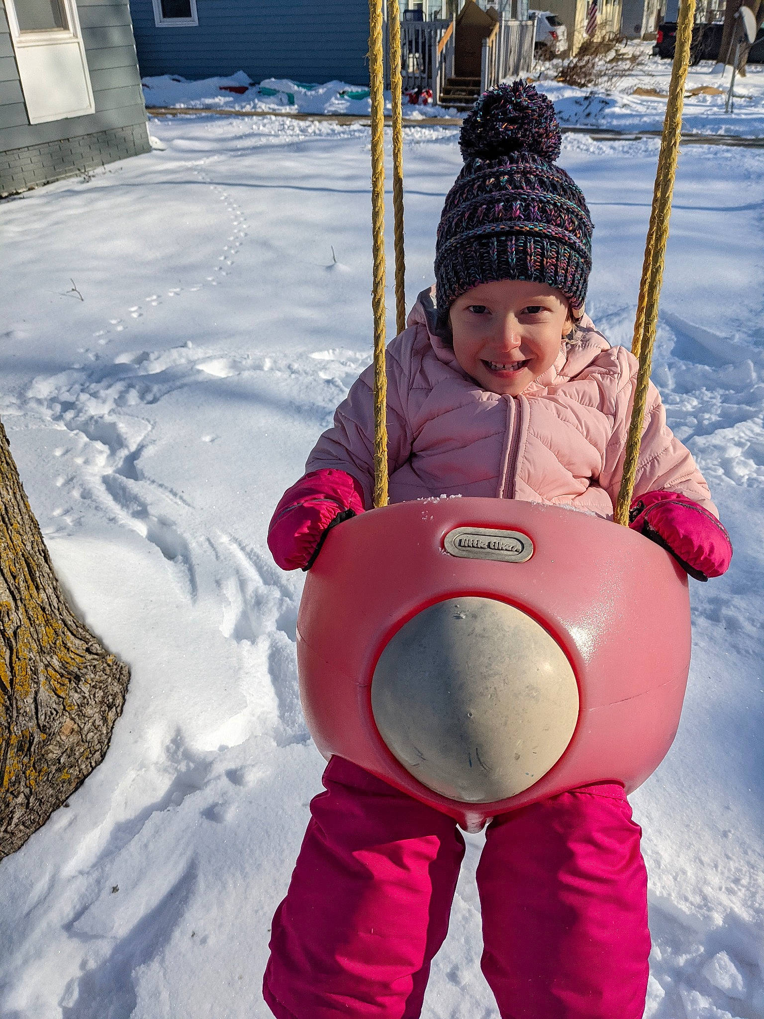 Harper joined the competition — help win amazing prizes! baby, child, city, freezing, fun, happy, headwear, joy, leisure, outdoor_play_equipment, people_in_nature, person, play, playground, playing_in_the_snow, playing_with_kids, public_space, recreation, snow, swing