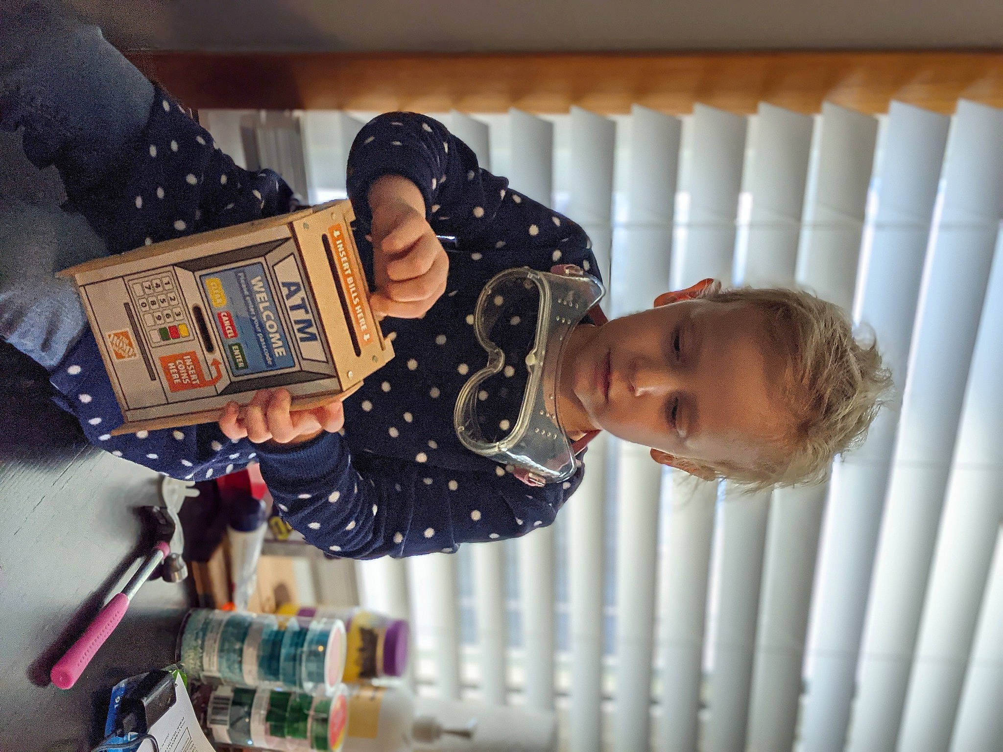 Harper is registered to the contest to win money with this photo: baby, baby_products, baby_safety, baby_toddler_clothing, child, comfort, cradle, design, fashion_accessory, flag, happy, infant_bed, linens, nursery, pattern, person, room, sleeve, toddler, wood