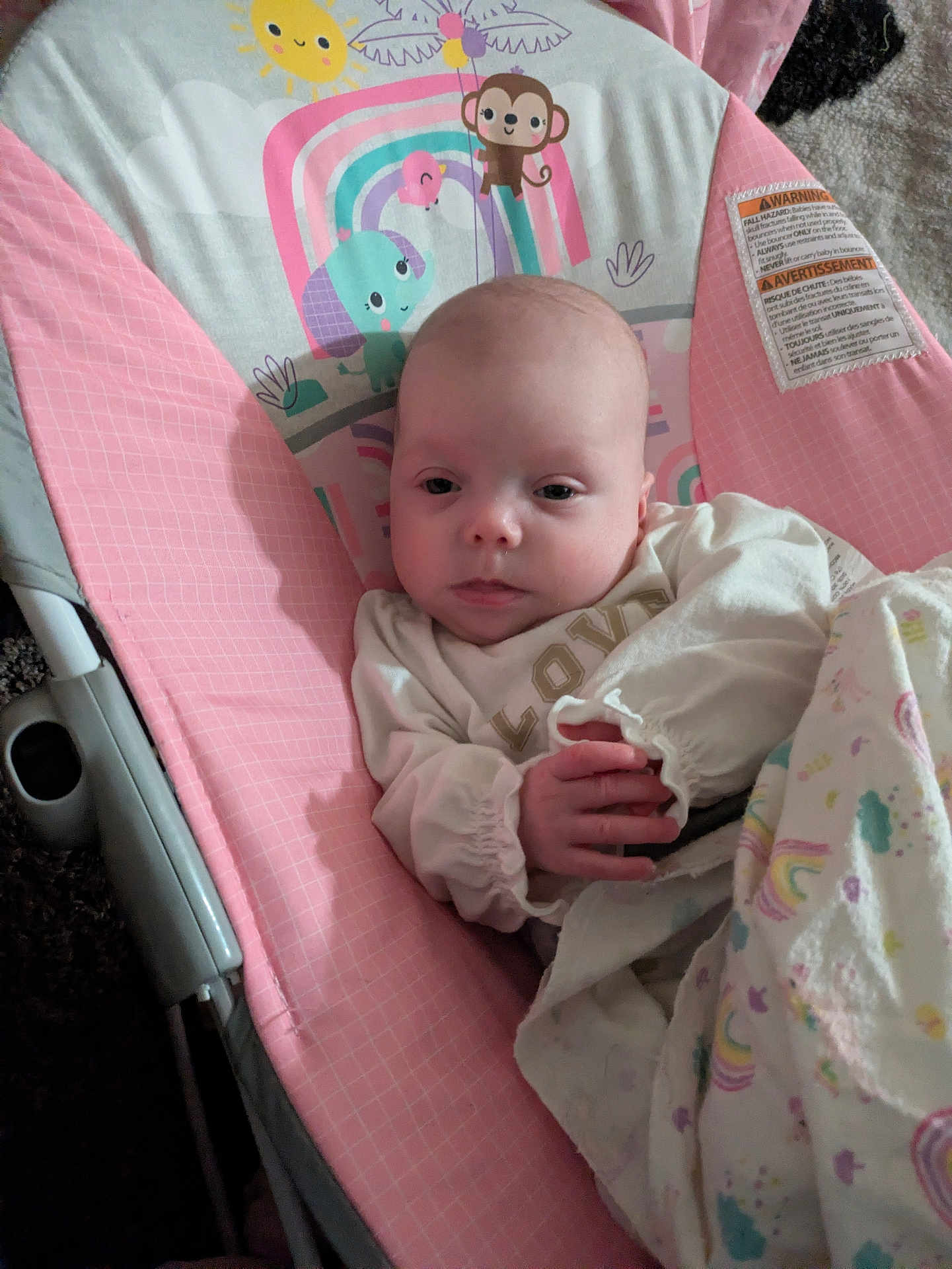 Everly joined the competition — help win amazing prizes! baby, infant, blanket, baby_rocker, pink, animal_print, monkey, elephant, sun, clothing, person, face, hand, indoor, soft_lighting, cute, child, resting, portrait, cozy