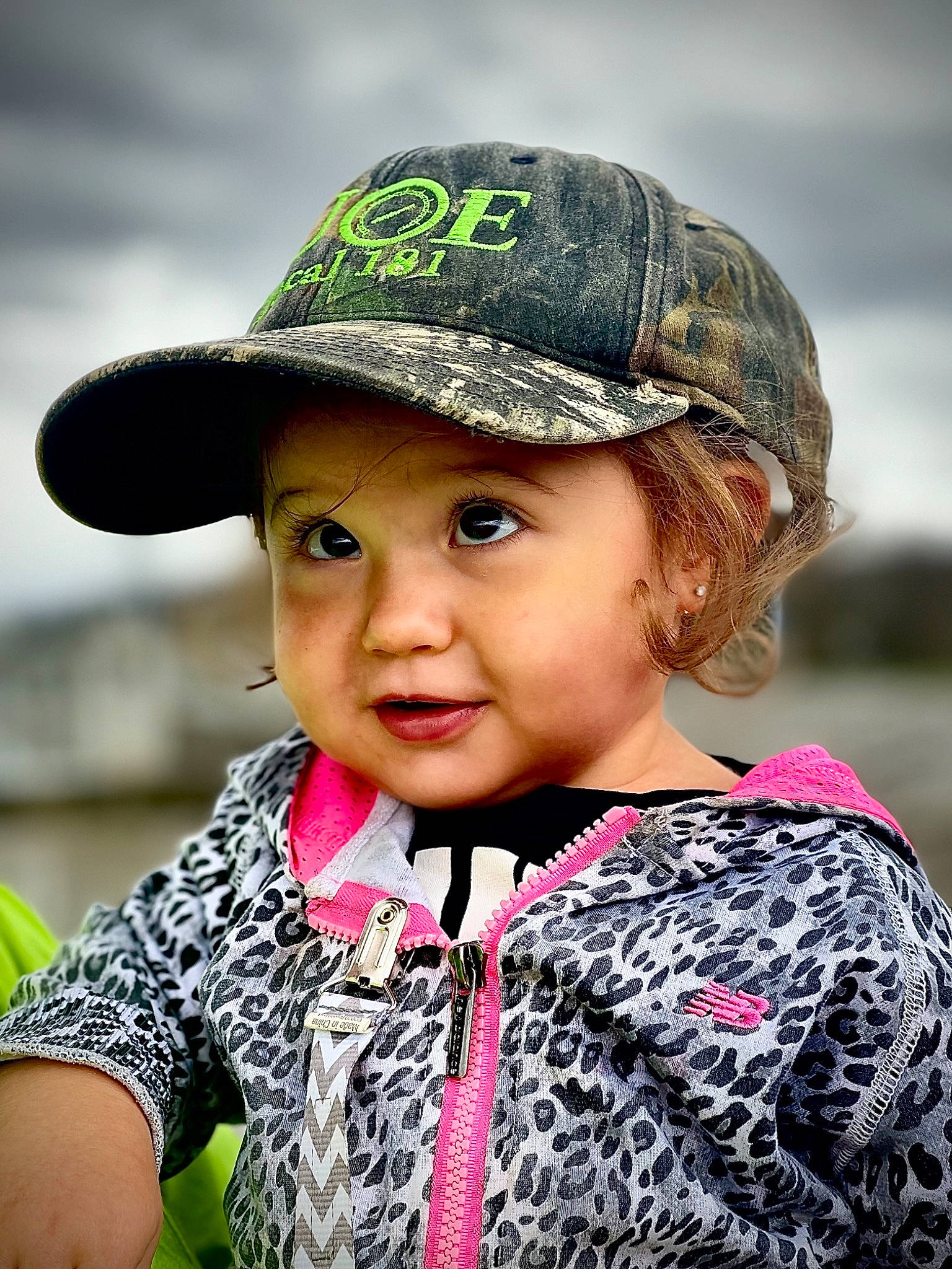 Bristol is registered to the contest to win money with this photo: cap, clothing, cool, eye, facial_expression, fashion, flash_photography, grass, hairstyle, happy, hat, headwear, lip, person, photograph, skin, sleeve, smile, street_fashion, style