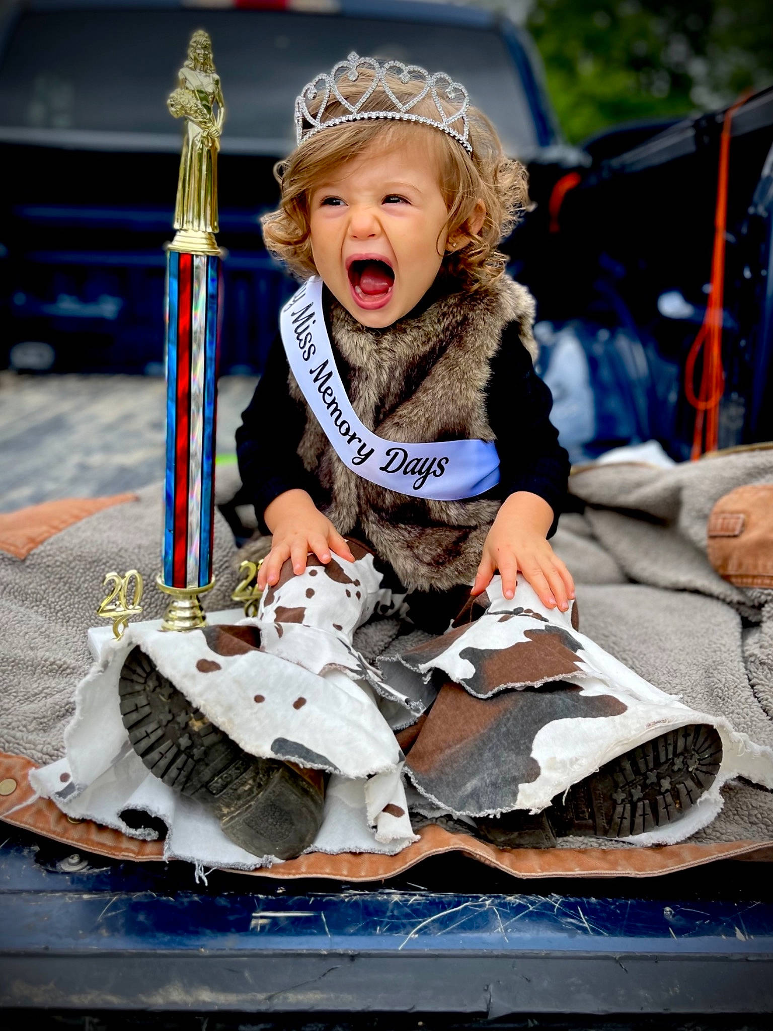 Bristol joined the competition — help win amazing prizes! boot, child, city, costume, event, fashion_accessory, festival, fun, happy, headgear, leisure, person, public_event, recreation, sitting, smile, street_fashion, street_performance, toddler, tradition