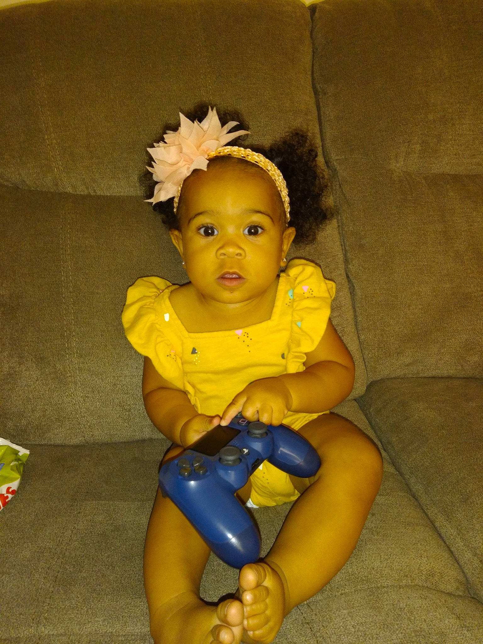 Leilani is registered to the contest to win money with this photo: abdomen, baby_products, baby_toddler_clothing, chair, chest, comfort, doll, finger, gesture, happy, human_leg, jewellery, nail, person, plastic, thigh, thumb, toddler, toy, trunk