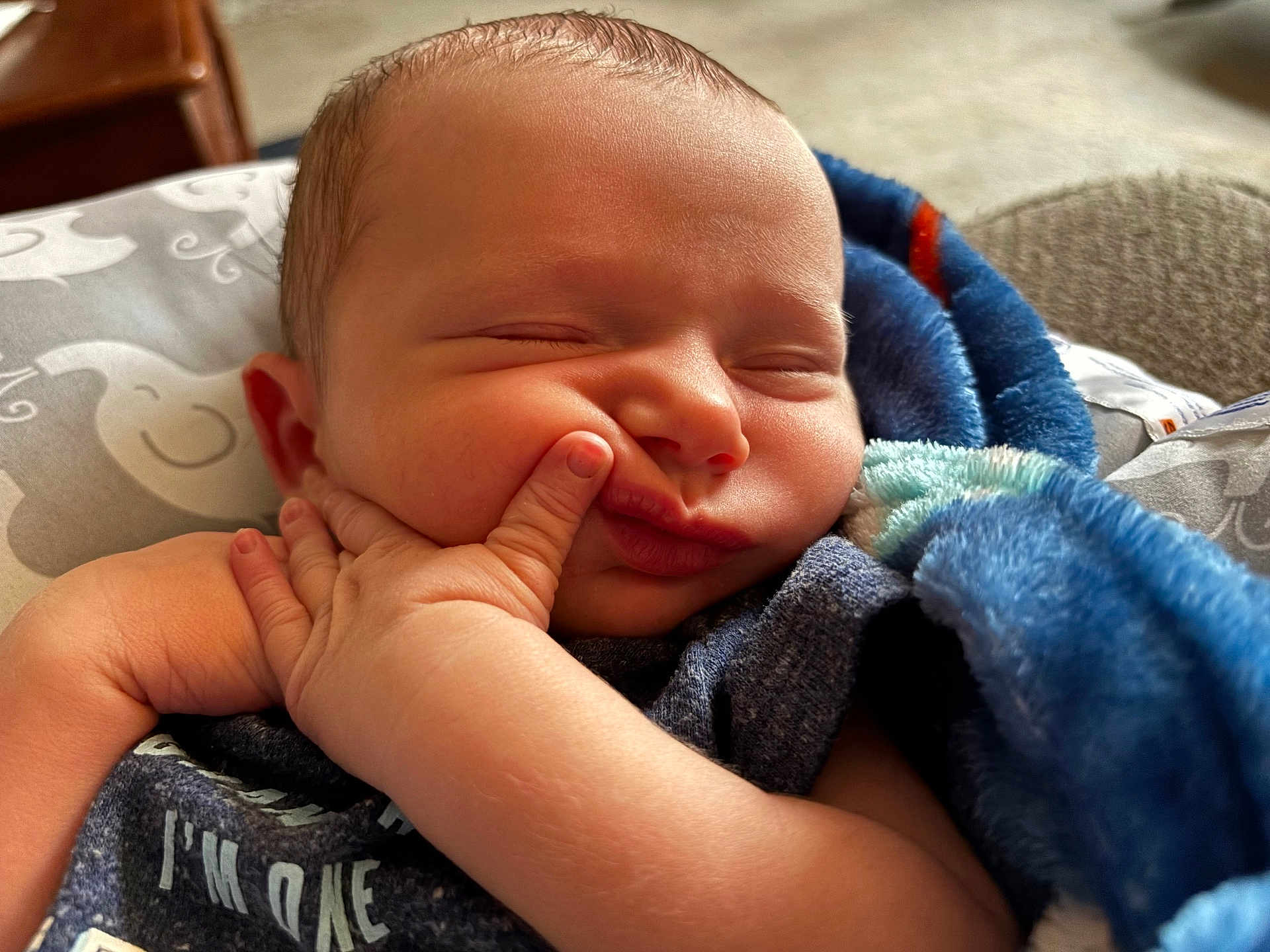 Jaxon joined the competition — help win amazing prizes! baby, sleeping, face, hand, blanket, clothing, infant, skin, cute, peaceful, newborn, cozy, soft, indoors, child, portrait, closeup, rest, comfort, expression