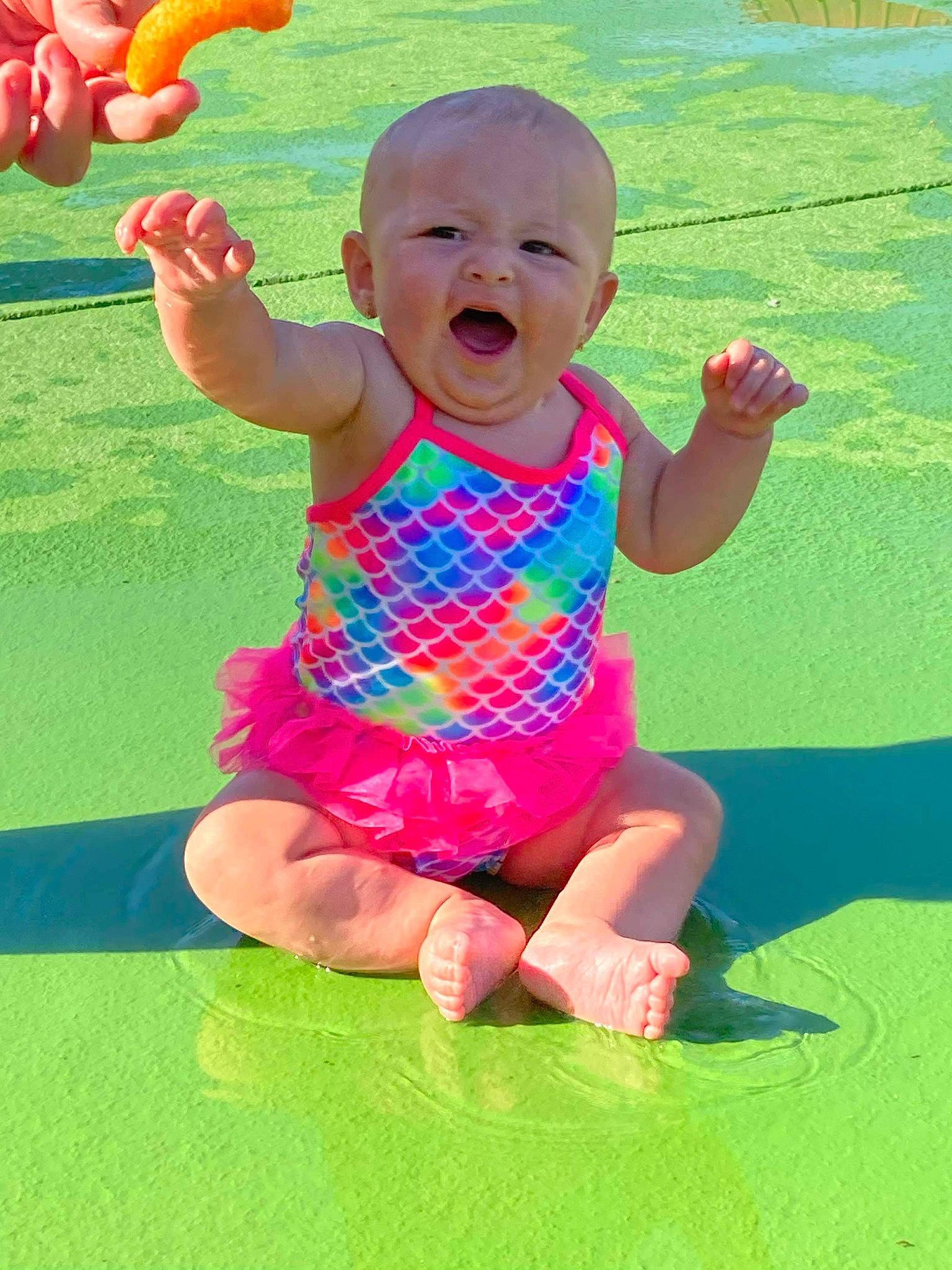Dixie joined the competition — help win amazing prizes! baby_toddler_clothing, facial_expression, finger, fun, gesture, grass, hand, happy, head, leisure, people_in_nature, person, photograph, pink, product, red, skin, sleeve, smile, summer