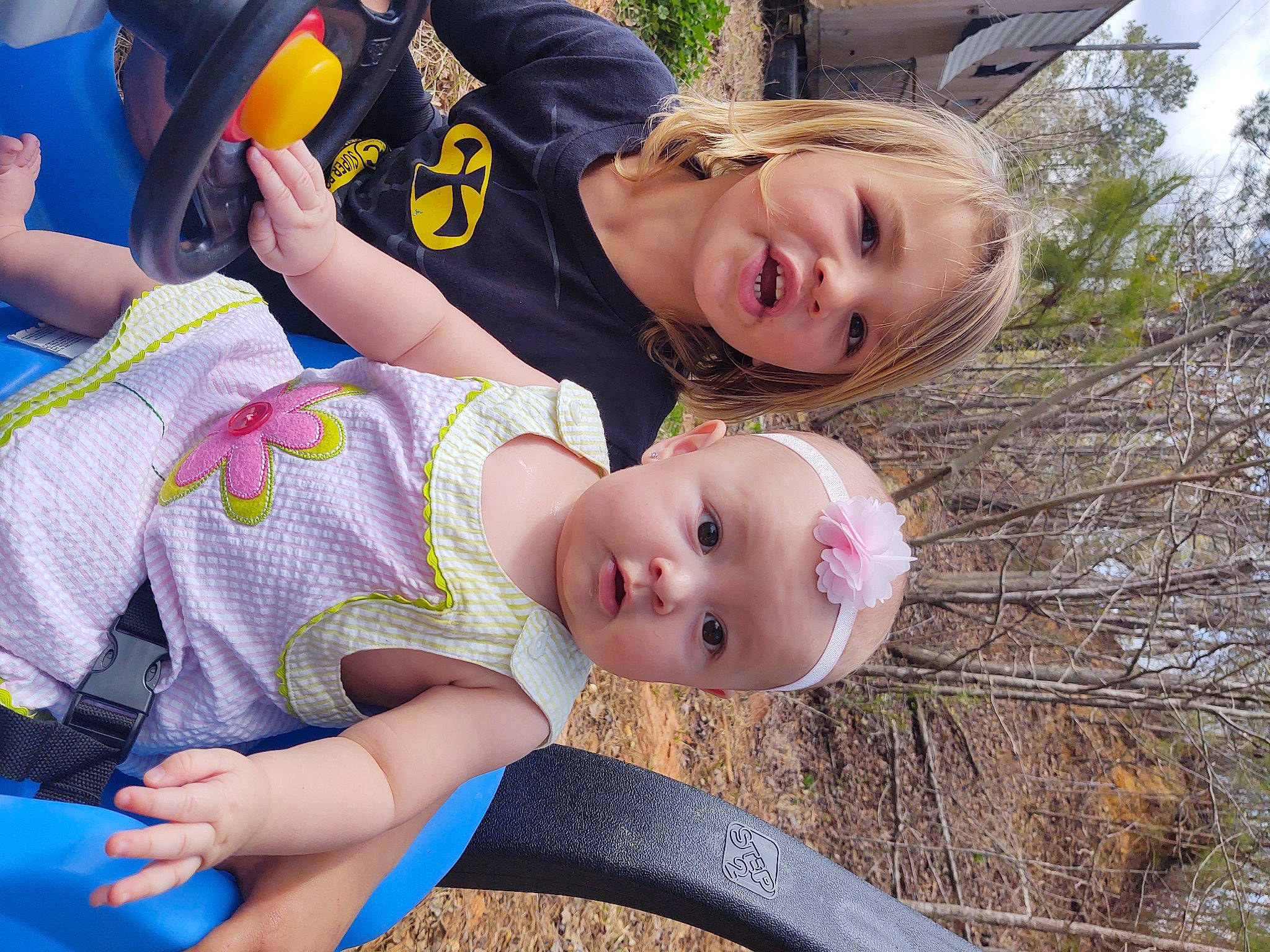 Dixie joined the competition — help win amazing prizes! arm, baby, baby_toddler_clothing, beauty, child, fun, grass, happy, leisure, people_in_nature, person, photograph, plant, recreation, sitting, skin, smile, thigh, toddler, tree