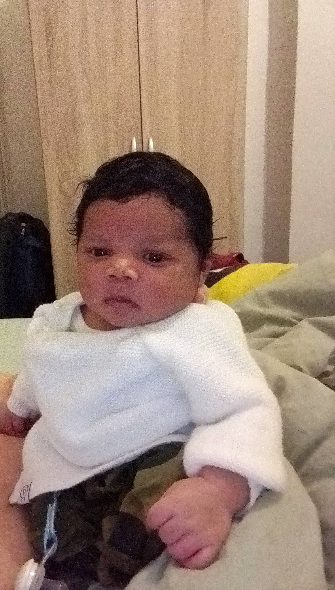 Kalvin participe au concours pour gagner de l'argent avec cette photo : baby, cheek, child, mouth, nose, person, sitting, skin, toddler