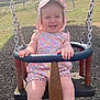 Aurora is registered to the contest to win money with this photo: baby, child, swing, playground, smiling, hat, floral_outfit, summer, outdoor, happy, grass, chain, park, people, daytime, cute, infant, seat, fun, sunlight