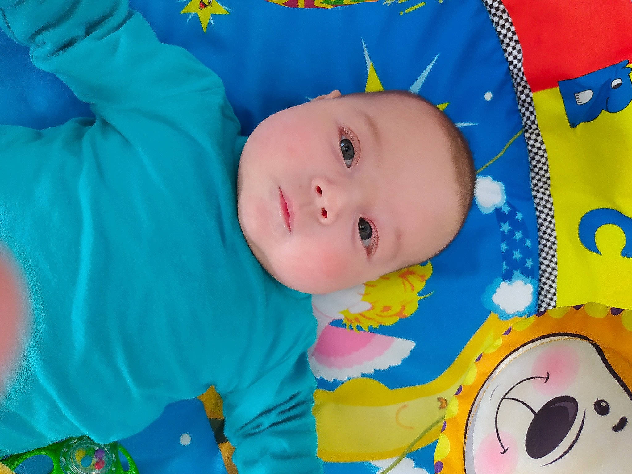 Thibaud a rejoint le concours — aidez-le/la à gagner de superbes lots ! aqua, art, azure, baby, baby_products, baby_toddler_clothing, cheek, child, electric_blue, facial_expression, fun, happy, linens, nose, pattern, person, product, smile, textile, toddler