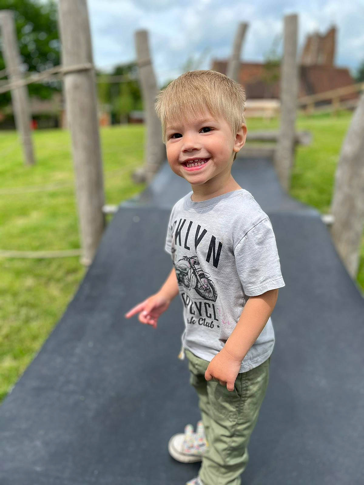 Niccolo joined the competition — help win amazing prizes! chin, cool, eye, facial_expression, fun, grass, grey, hair, happy, head, joy, leisure, person, plant, shorts, shoulder, sky, sleeve, smile, t_shirt