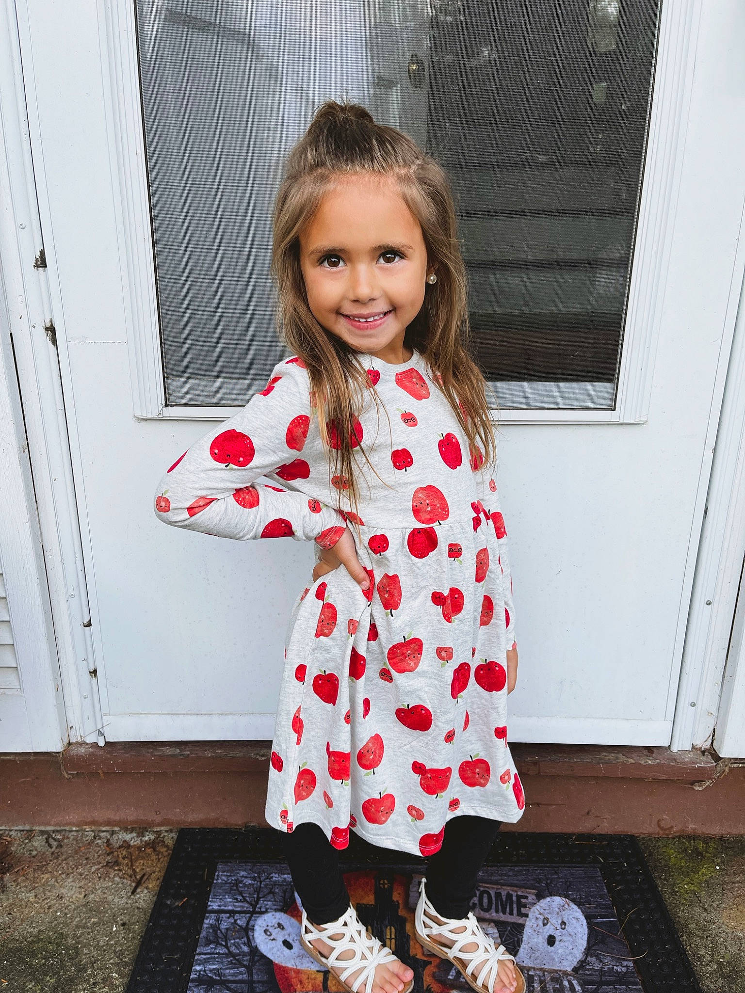 Adelina is registered to the contest to win money with this photo: baby_toddler_clothing, clothing, day_dress, dress, fashion, footwear, hairstyle, happy, joint, joy, knee, one_piece_garment, pattern, person, pink, shoulder, sleeve, smile, standing, street_fashion