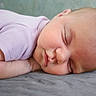 Scarlett is registered to the contest to win money with this photo: baby, sleeping, infant, face, skin, clothing, onesie, peaceful, rest, closeup, head, cheek, soft, cozy, newborn, child, portrait, relaxation, indoors, cute