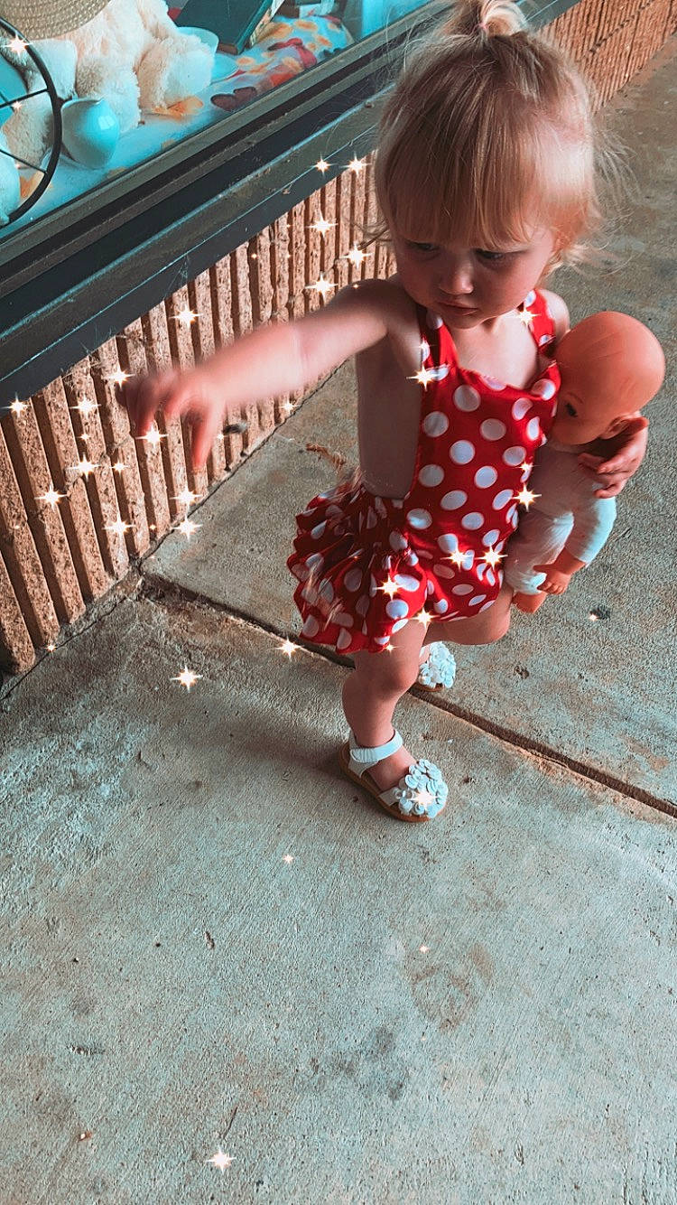 Jazelle is registered to the contest to win money with this photo: baby, baby_toddler_clothing, foot, grass, hair, happy, human_leg, joint, knee, leg, leisure, pattern, person, pink, plant, sandal, shoe, skin, sneakers, thigh