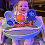 Rylie joined the competition — help win amazing prizes! baby, smiling, walker, toy, indoor, child, fisher_price, play, happy, footwear, socks, furniture, carpet, home, person, infant, seat, colorful, cute, joyful