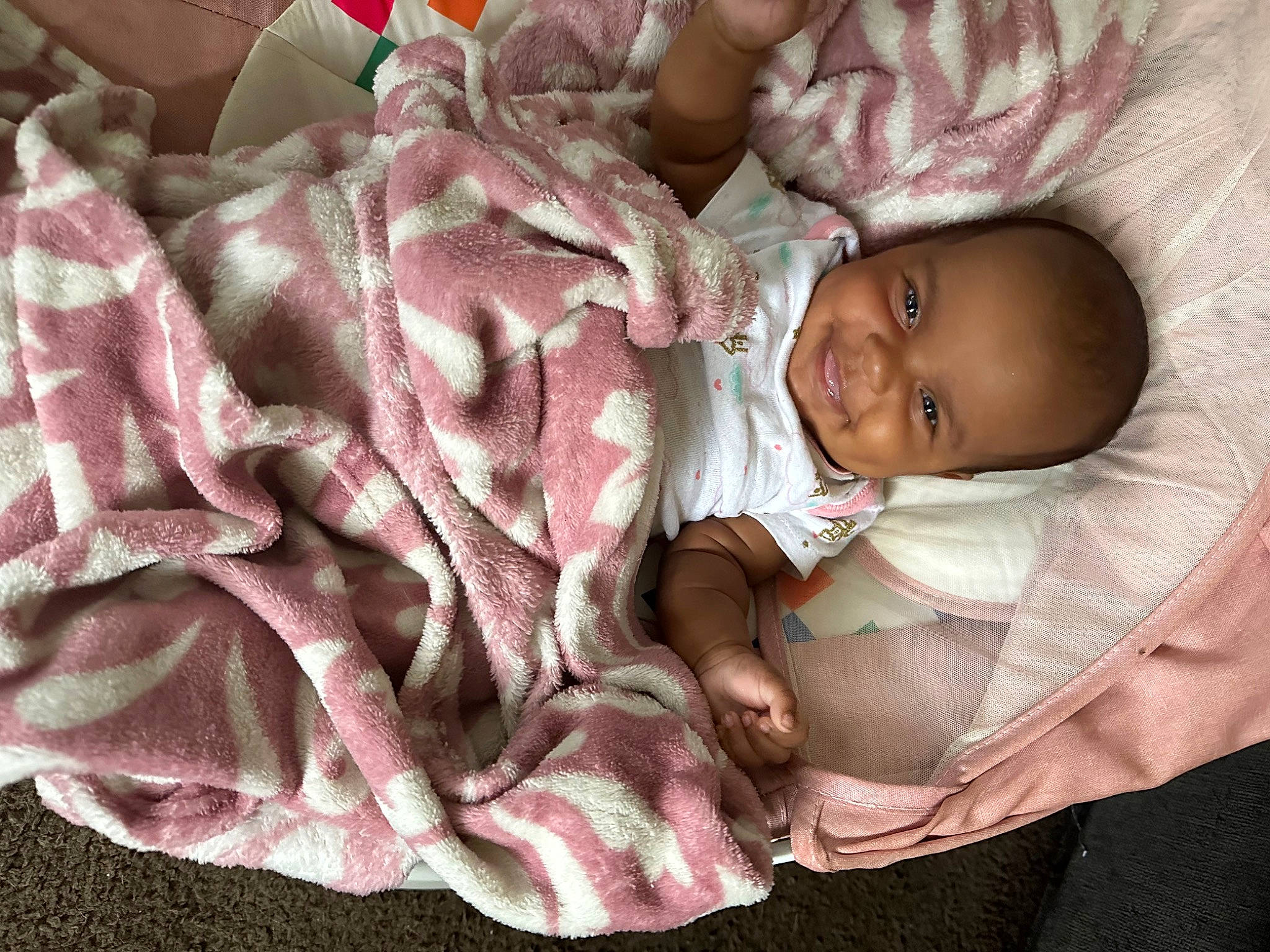 Abrielle joined the competition — help win amazing prizes! baby, baby_products, baby_toddler_clothing, bedding, bedtime, carmine, cheek, child, comfort, eye, happy, linens, magenta, nap, pattern, person, petal, pink, sleep, smile