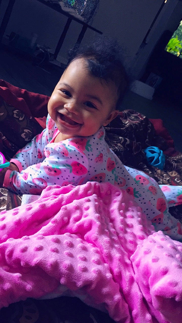 Jurni is registered to the contest to win money with this photo: baby, beauty, child, costume, dress, face, flower, fun, happy, human, joy, lady, magenta, person, pink, plant, purple, skin, smile, textile