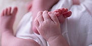 Ivet is registered to the contest to win money with this photo: baby, hand, foot, infant, skin, closeup, soft, newborn, fingers, toes, white_clothing, delicate, cute, tender, small, human, child, pink, baby_skin, newborn_clothing
