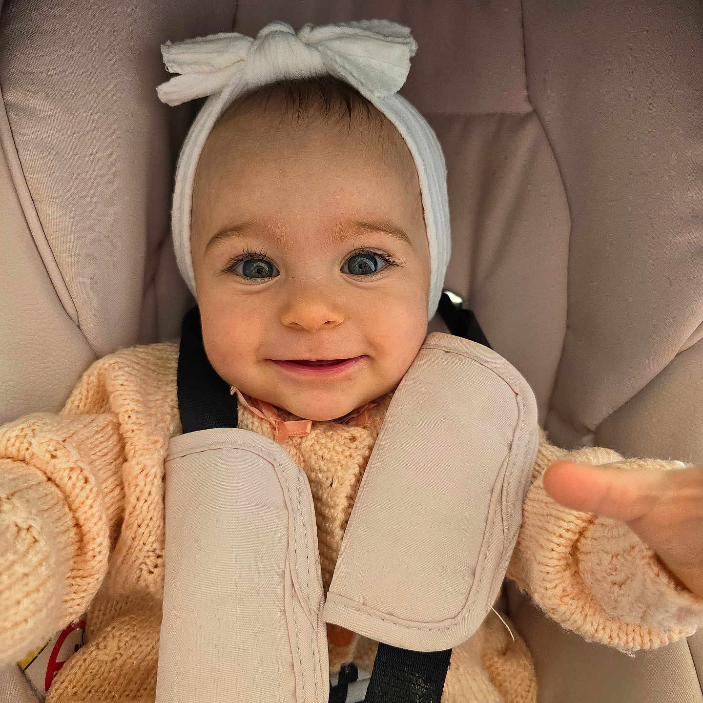 Sara joined the competition — help win amazing prizes! baby, bodypart, bonnet, clothing, coat, cushion, face, finger, hand, happy, hat, head, homedecor, jacket, knitwear, person, photography, portrait, smile, sweater