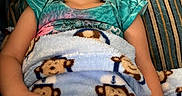 Echo is registered to the contest to win money with this photo: child, girl, sleeping, sleepy, portrait, indoors, chair, blanket, teddy_bears, pillow, books, home, furniture, blonde_hair, closed_eyes, relaxed, resting, cozy, candid, photography