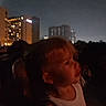 Echo joined the competition — help win amazing prizes! child, toddler, baby, portrait, profile, night, outdoor, city, skyline, buildings, crowd,  사람, dark, low_light, urban, looking_up, white_shirt, silhouette, nightlife, photography
