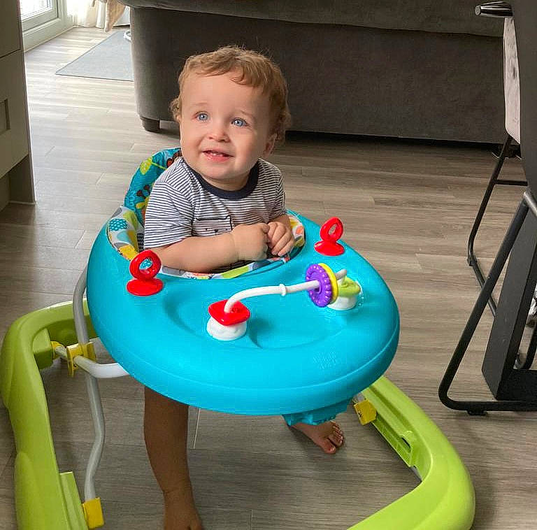Rafa joined the competition — help win amazing prizes! baby, baby_playing_with_toys, baby_toddler_clothing, baby_toys, cabinetry, chair, child, comfort, electric_blue, facial_expression, fun, furniture, joy, leisure, person, play, recreation, sharing, sitting, smile
