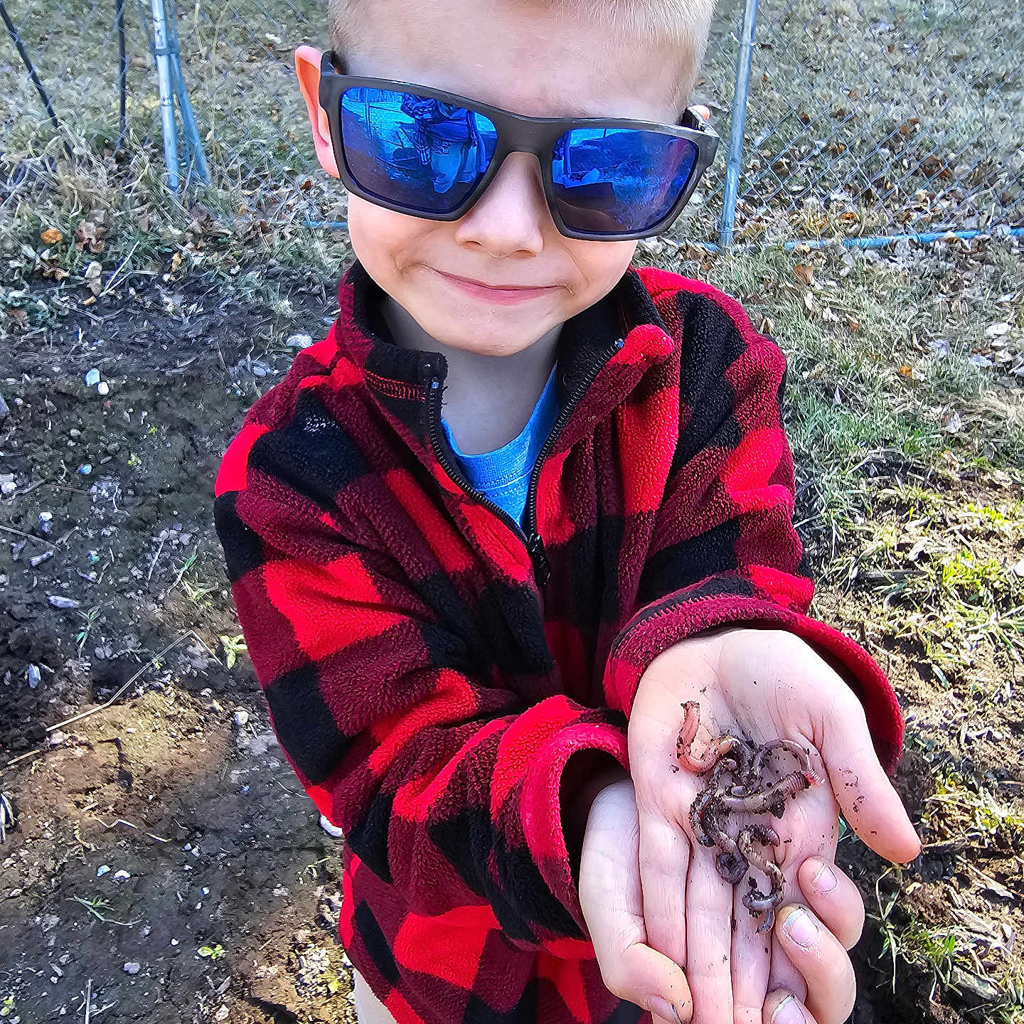 Tucker joined the competition — help win amazing prizes! accessories, animal, bodypart, boy, child, clothing, coat, face, finger, glasses, hand, head, invertebrate, male, person, photography, portrait, soil, spider, sunglasses