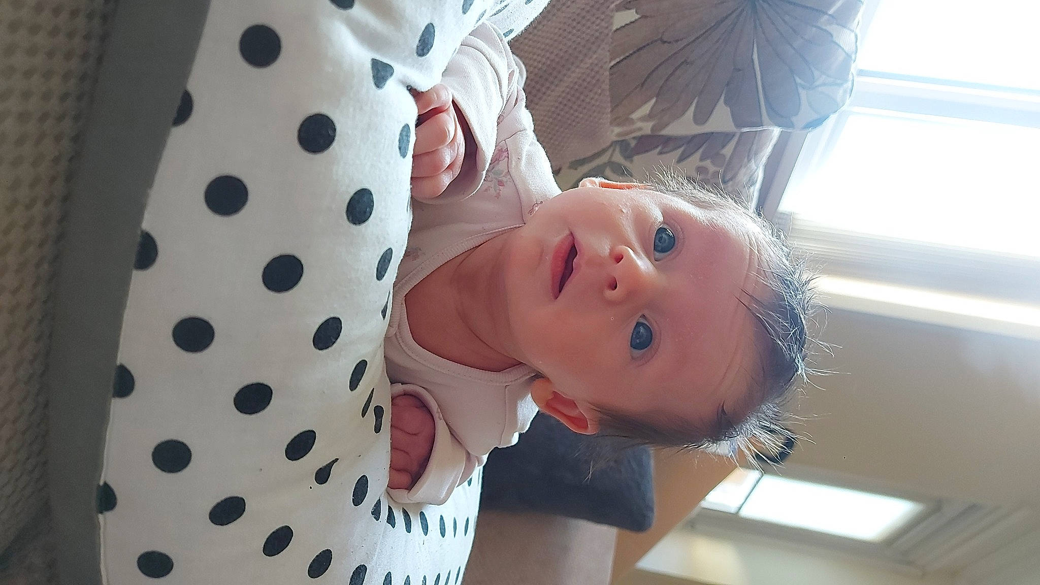 Beau is registered to the contest to win money with this photo: baby, baby_products, baby_toddler_clothing, cheek, chest, child, comfort, eyelash, fun, happy, pattern, person, polka_dot, skin, sleeve, toddler, wood