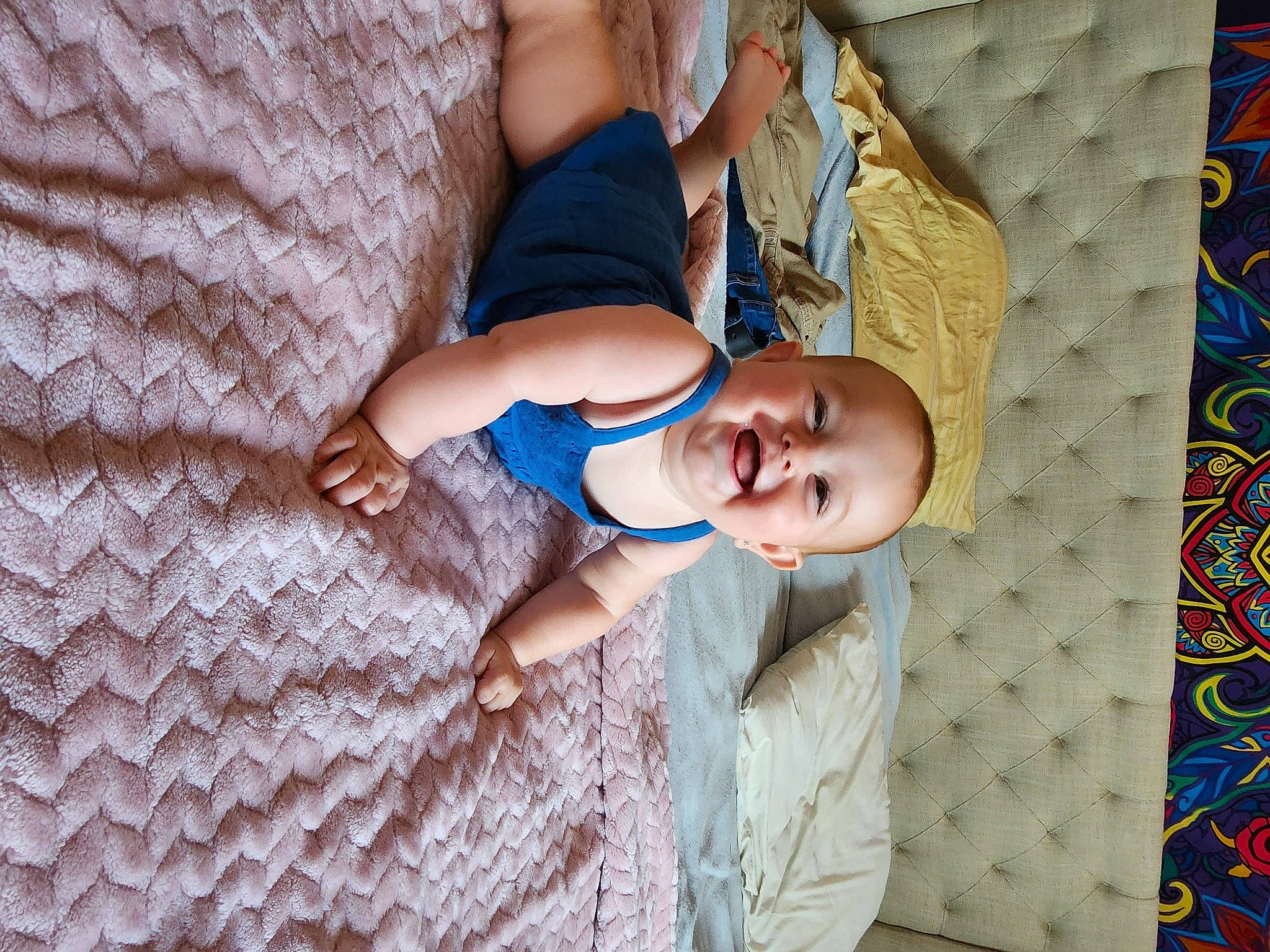 Reagan is registered to the contest to win money with this photo: baby, baby_products, baby_toddler_clothing, child, comfort, flooring, fun, happy, human_leg, joy, leaf, leisure, linens, pattern, person, room, sitting, thigh, toddler, tree