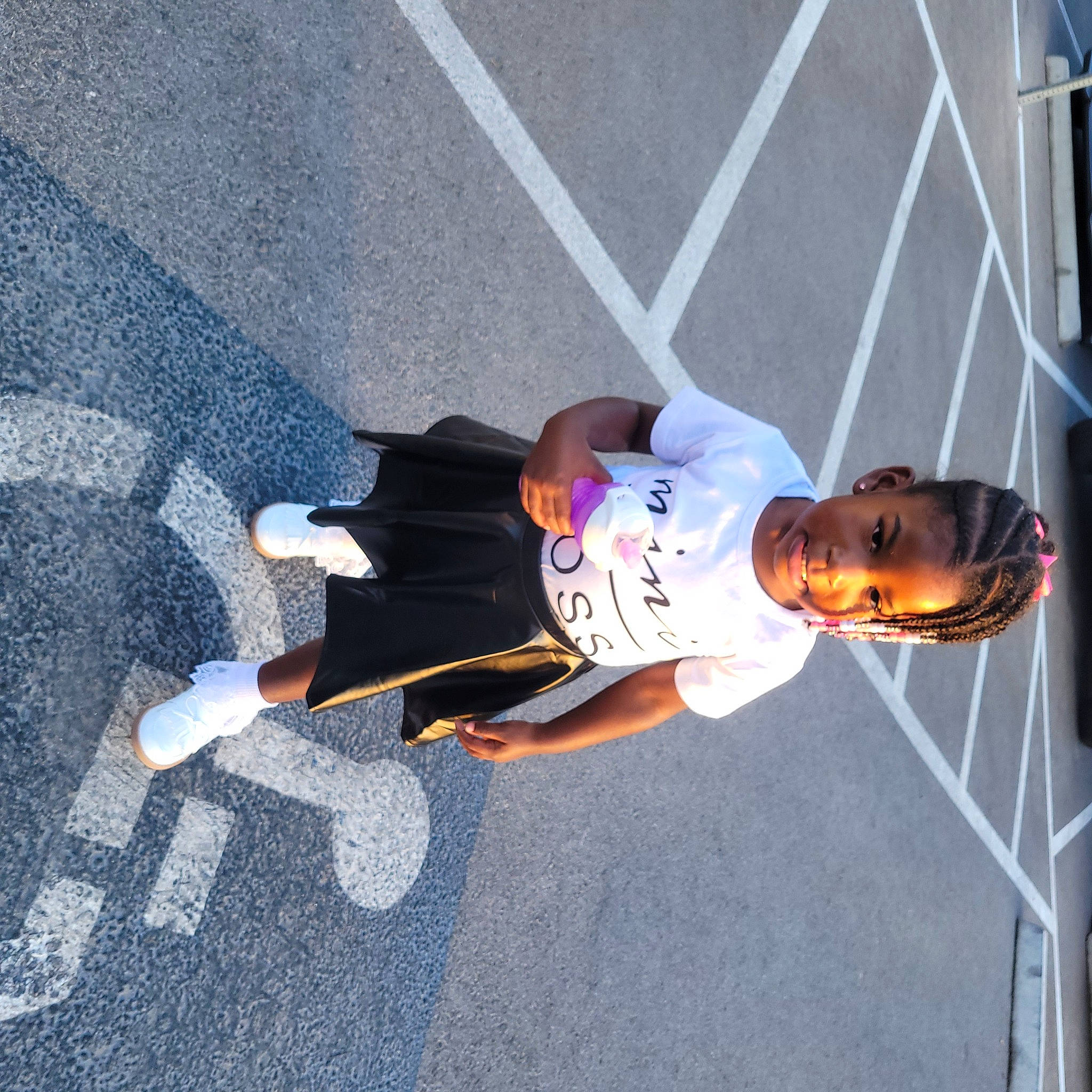Iyana is registered to the contest to win money with this photo: asphalt, concrete, electric_blue, fun, hat, knee, person, recreation, road_surface, shadow, sidewalk, t_shirt, tar, walking_shoe
