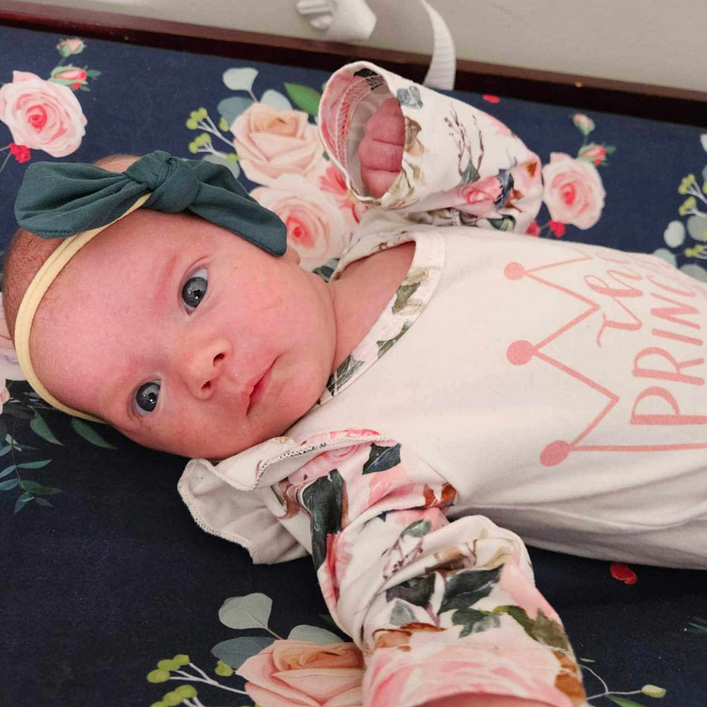 Elizabeth joined the competition — help win amazing prizes! accessories, baby, bed, bonnet, clothing, couch, cushion, dress, face, furniture, hat, head, homedecor, indoors, newborn, person, photography, portrait, quilt, t_shirt