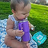 baby, baby_wipes, blanket, casual, child, cute, drinking, grass, greenery, infant, nature, outdoor, playtime, portrait, purple_cup, sitting, summer, sunlight, toy, young_child