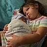 affection, baby, blanket, care, child, comfort, couch, cute, family, holding, hospital, indoor, love, newborn, pillow, portrait, seated, sibling, striped_shirt, toddler