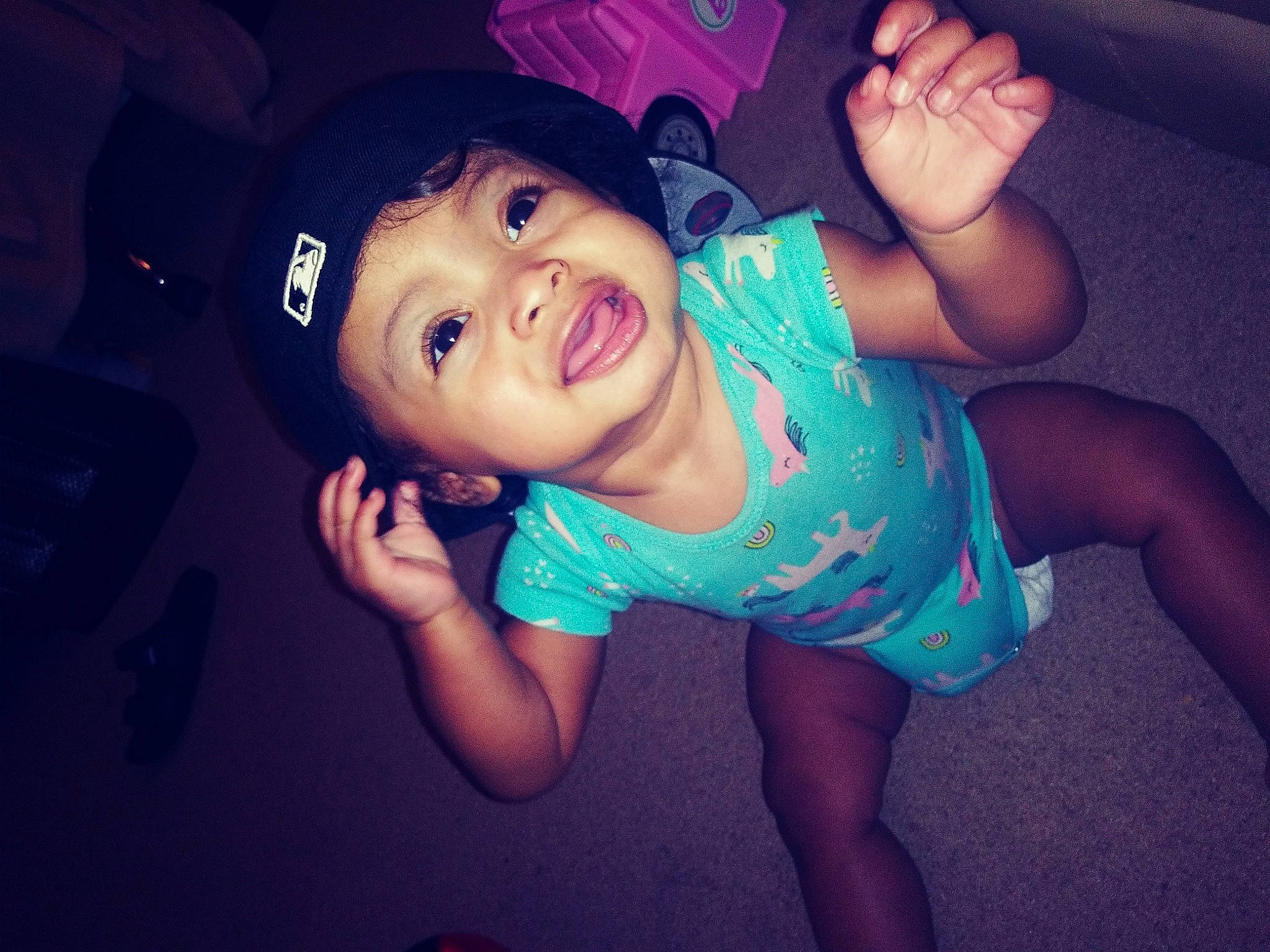 Kamiyah is registered to the contest to win money with this photo: arm, baby_toddler_clothing, cap, cool, elbow, facial_expression, finger, flash_photography, gesture, hairstyle, hand, happy, hat, leg, mouth, person, pink, skin, smile, t_shirt